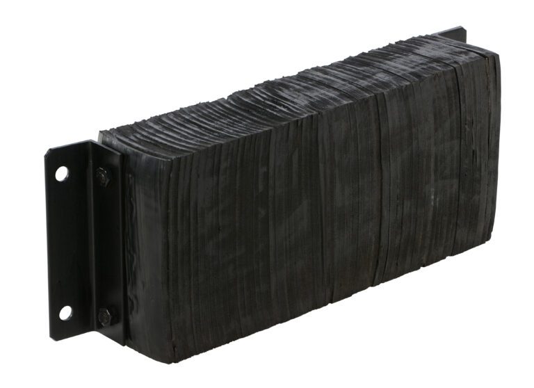 1230-6_A.jpg The Vestil Laminated Dock Bumper 12 X 30 X 6 In is a black, rectangular rubber bumper with a layered texture, mounted on a metal bracket. It has two holes in the bracket for secure mounting.
