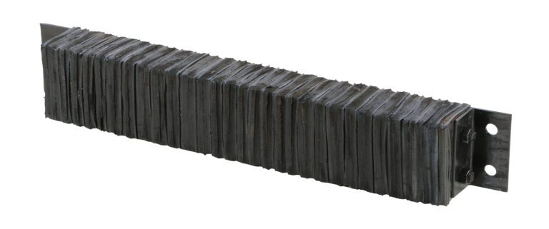 A metal object reminiscent of a Vestil Laminated Dock Bumper 6 x 36 x 4.5 in, with a long rectangular shape, textured ribbed surface, and two mounting holes on one end; it features a dark, worn finish.