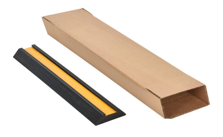 The Vestil Extruded Rubber Bumper Stop 24L In Box, featuring a textured black border with a smooth yellow center, is displayed next to an open brown cardboard box.