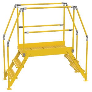 The Vestil Cross-Over Ladder 3 Step is yellow, featuring railings on both sides for secure navigation over obstacles. Standing 28 inches high and 38 inches wide, it is crafted from metal for industrial use, ensuring stability and safety.