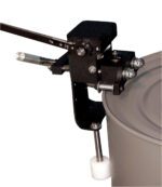 A can seamer, akin to a Vestil Burr-Free Manual Drum Deheader 3-5 Pass, efficiently seals by clamping onto a metal rim. It features a lever and metallic parts including a roller and cylindrical tool.