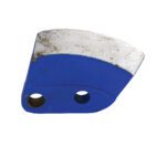A curved, sharp-edged Vestil Drum Deheader Blade for DD-10 features a blue painted section with two circular holes. The blade shows signs of wear, with visible rust spots on its metal surface.