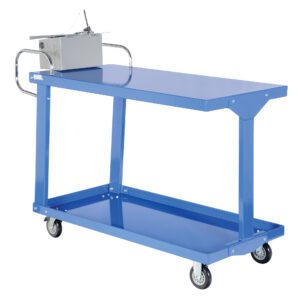 The Vestil Easy Access Stock Truck W/Table 24 X 48 is a sturdy blue metal cart with two shelves and swivel caster wheels for smooth mobility. It includes a handle-equipped metal box for organized storage, set against a plain white backdrop.
