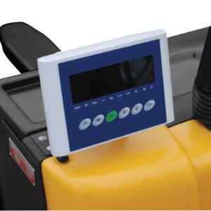 The Vestil Elec Pallet Truck 3K-25X47 Scale (2)12V features a yellow control panel with a digital screen, green and blue icons for power and navigation, plus a lever and black protective cover enhance the functionality of this robust machinery.