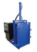 The Vestil Crusher/Compactor 460V High Cycle Pkg, in blue, is an industrial baler with a tall vertical cylinder for efficient compression. It features a securely closed door with latches and a unique black section, perfect for high-volume material processing.