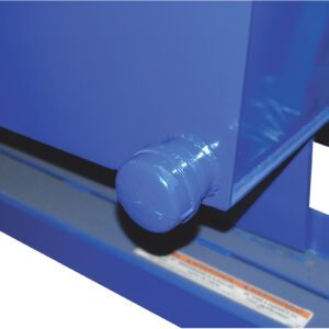 A close-up of a blue metal apparatus resembling the Vestil Hopper - Leak Proof Option, featuring a protruding knob on one side. Set against a similar blue frame, its glossy, newly painted surface also reveals a coiled metal spring partially visible to the right.