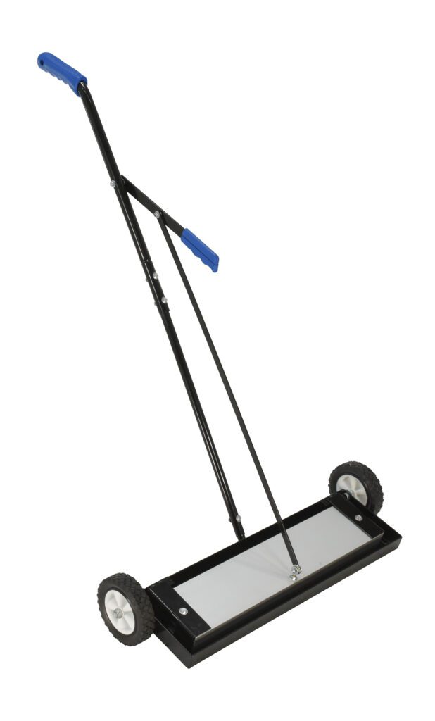 The Vestil Magnetic Sweeper Bended Handle 24 In features a rectangular base, two wheels, and blue grips. This black sweeper efficiently collects metal debris with an adjustable handle that tilts backward for easy maneuverability.