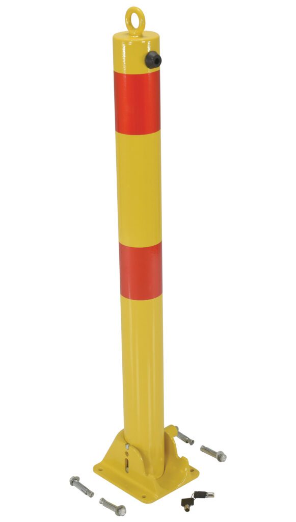 A yellow and red steel bollard with a lockable base, shown upright against a white background, is the Vestil Fold-Down Bollard 3 In Dia. It includes four metal bolts and a key placed nearby.