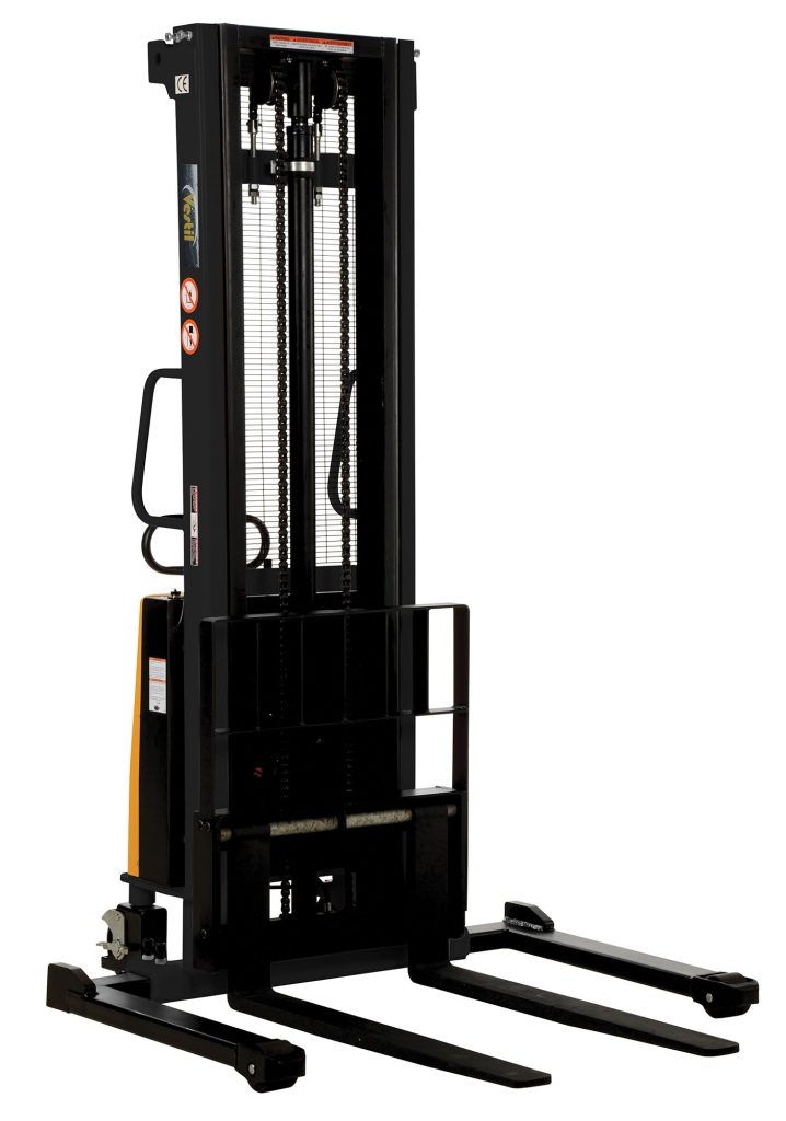 SL-137-AA_A.jpg The Vestil Adjustable Stacker W/Powered Lift 137 In has a black hydraulic forklift stacker with a vertical lift, two-pronged forks at the base, and safety warnings on the side, displayed freestanding against a white background.