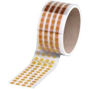 A roll of tape showcases rows of 1/4 dots in yellow and orange similar to Kapton® Discs (1000/Roll). When partially unrolled, it reveals this fun pattern on a clear strip with the core offering an intriguing peek into its vibrant design.
