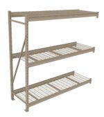 A beige metal storage rack with three wire mesh shelves. The rack stands on four posts with a cross-braced side for support. The top shelf is solid, and the other shelves are open grid, suitable for storing various items.