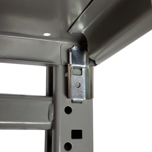 lyon-bulk-storage-rack-integration-clip-nf65160.jpg Close-up of a metal shelving units corner, showing a shiny metal connector piece. The shelves are gray with holes along the side for adjustable height. The image highlights the sturdy construction of the shelving system.