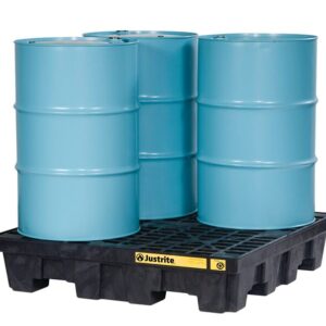 Three blue industrial barrels sit on a Justrite 4 Drum Square Eco Blk pallet with a black grid top. The setup, showcasing the distinct yellow brand label, is placed against a plain white background.
