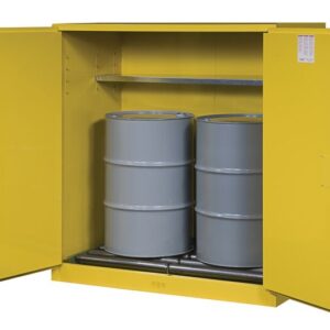 A Justrite Cabinet, Vdrm/Rlr (2)55G Mn Yl, is open to reveal two large grey barrels inside with a metal shelf above for added utility.
