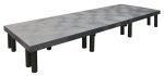 A modern gray Quantum Polymer Dunnage Rack with a textured polyethylene surface and sturdy black legs, made in the USA, supports up to 2700 lbs. Ideal for large meetings or dining spaces.